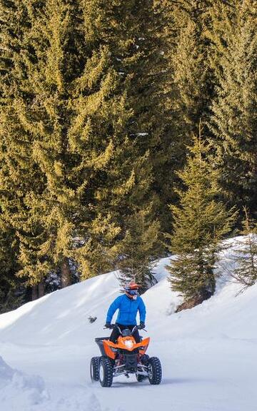 © Loodsen van quad op ijs_Flaine - OT Flaine - C.Genard